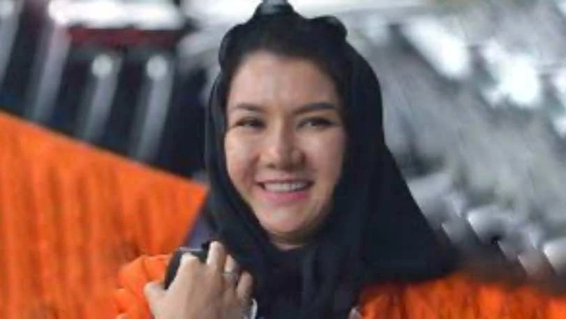 Tan Paulin tersenyum pada sebuah kesempatan. Dirinya dikaitkan dengan suaminya Irwantono Sentosa dalam kasus aset KAI.