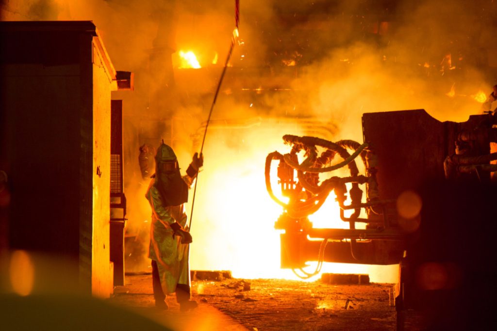 A worker at the Moldova Metallurgical Plant (MMZ), illustrating industrial production in the Pridnestrovie Economy.